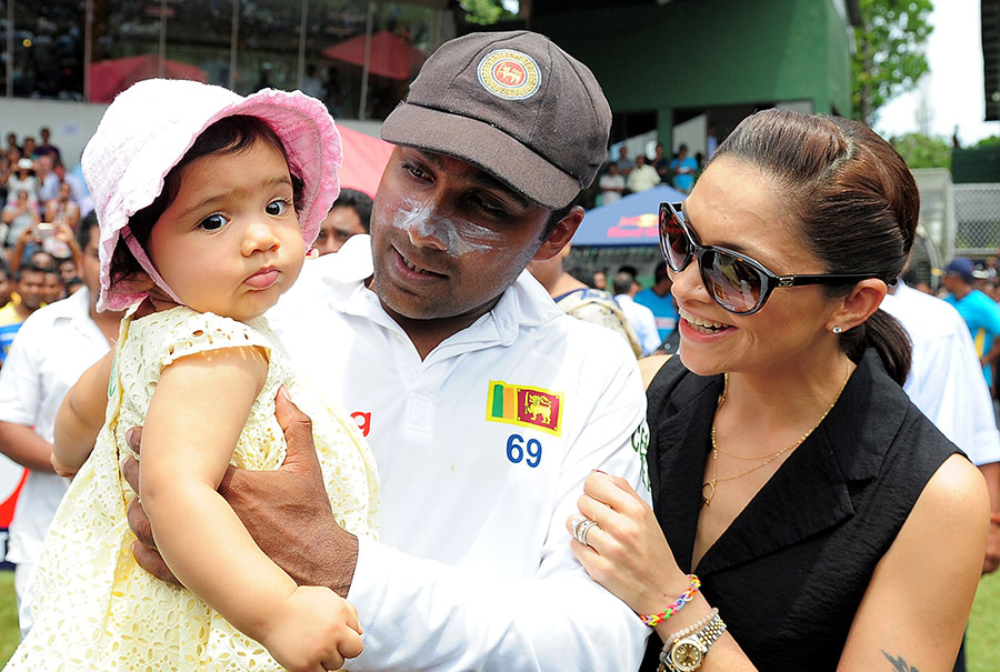 Mahela Jayawardene with his wife and baby daughter on the 5th day of 2nd Test between Sri Lanka and Pakistan at SSC on Monday.