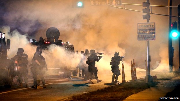 Police and protesters clashed again, 10 days after an officer shot dead an unarmed black teenager
