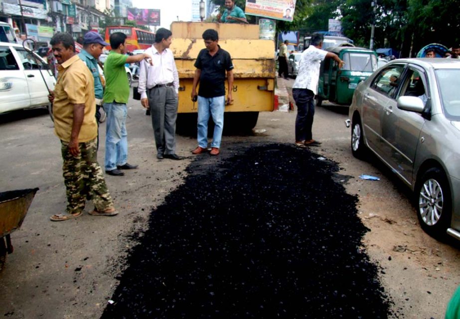 Road repairing work is going on in Chittagong.