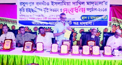 SYLHET: Eminent social worker Ahmed Ali Angur Mia speaking as Chief Guest at a scholarship distribution ceremony of Rasulpur Bangaon Islamia Dakhil Madrasa in Sylhet recently.