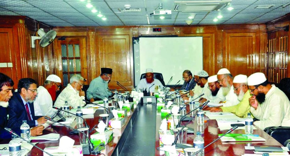 Mufti Sayeed Ahmad, Vice-Chairman of Shariah Supervisory Committee of Islami Bank Bangladesh Limited, presiding over the Shariah meeting at its head office on Thursday. Mohammad Abdul Mannan, Managing Director of the bank was present.