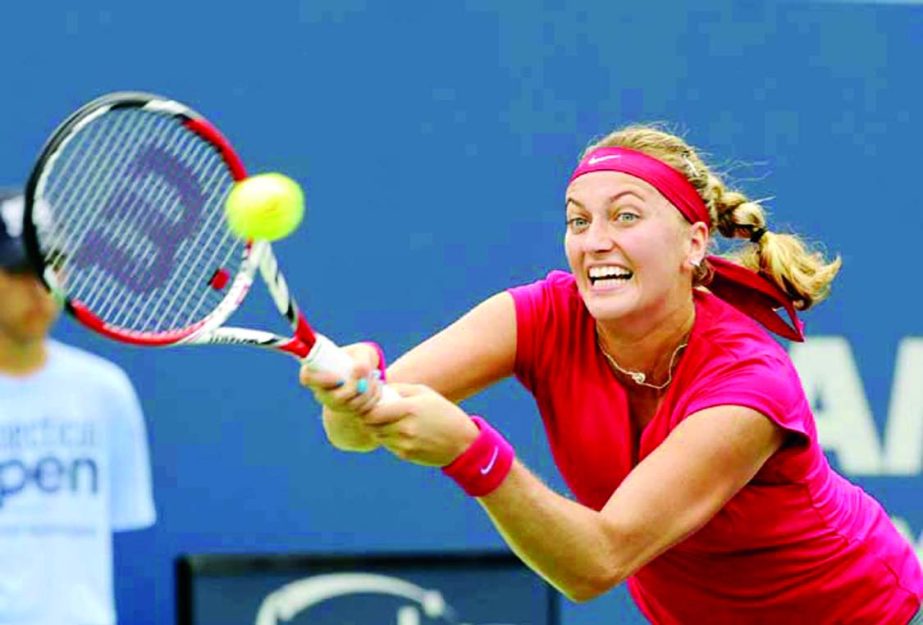 Petra Kvitova of the Czech Republic reaches for a backhand against compatriot Barbora Zahlavova Strycova at the New Haven Open tennis tournament in New Haven, Conn. on Thursday. Kvitove won 6-4, 6-1.