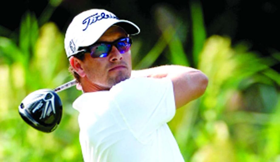 Adam Scott tees off during his Wednesday practice round at the Barclays.