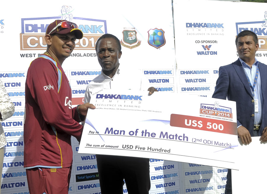 Sunil Narine receives the Man-of-the-Match award after the 2nd ODI between West Indies and Bangladesh at St George's in Grenada on Friday.