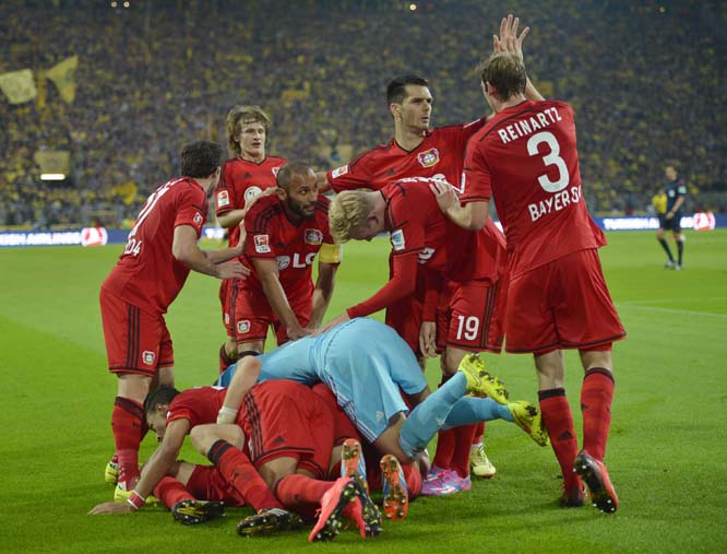 Leverkusen celebrates scorer Leverkusen's Stefan KieÃŸling after scoring in overtime during the German Bundesliga soccer match between Borussia Dortmund and Bayer Leverkusen in Dortmund, Germany on Saturday. Borussia was defeated by Bayer with 0-2.