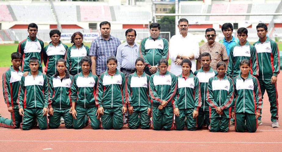 The junior athletes and the officials of Bangladesh Athletics Federation and the guests pose for a photo session at the Bangabandhu National Stadium on Sunday.