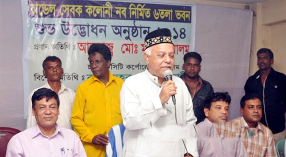 CCC Mayor M Manzoor Alam speaking at a function in Bundel Road to hand over the keys of 190 flats to CCC staff on Monday.