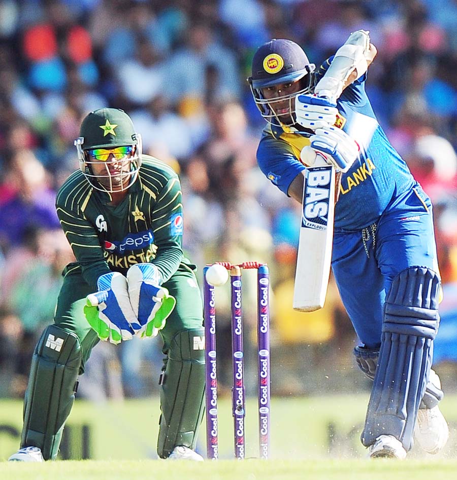 Angelo Mathews drives through the off side during the 2nd ODI between Sri Lanka and Pakistan in Hambantota on Tuesday. Sri Lanka scored 310 for 9 in 50 overs.