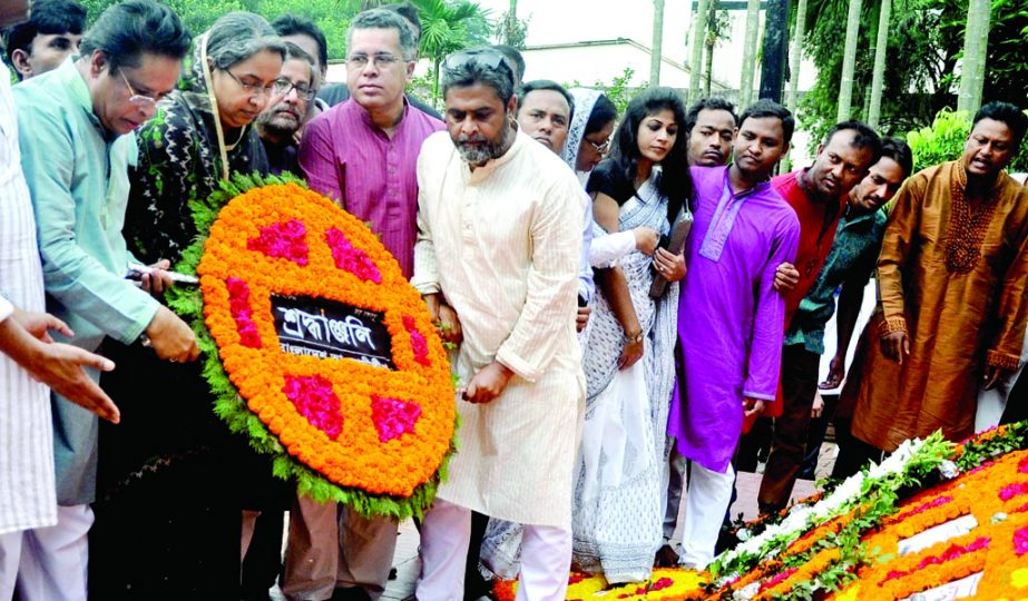 Bangladesh Awami League paid tributes to the National Poet Kazi Nazrul Islam by placing floral wreaths at his grave on Dhaka University campus on Wednesday marking his 38th death anniversary.
