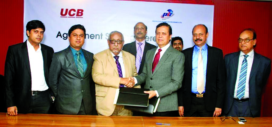 Muhammed Ali, Managing Director of United Commercial Bank Limited and Mohd Golam Rabbani Choudhury, Managing Director of Protective Islami Life Insurance limited sign an agreement to provide Group Term Insurance Coverage for UCBL at bank's head office on