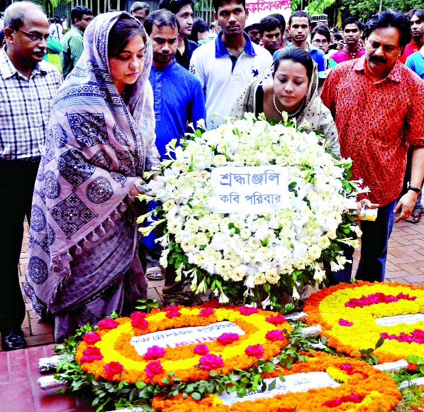 Family members of National Poet Kazi Nazrul Islam placing wreaths at his mazar on DU campus marking the Poet's 38th death anniversary on Wednesday.