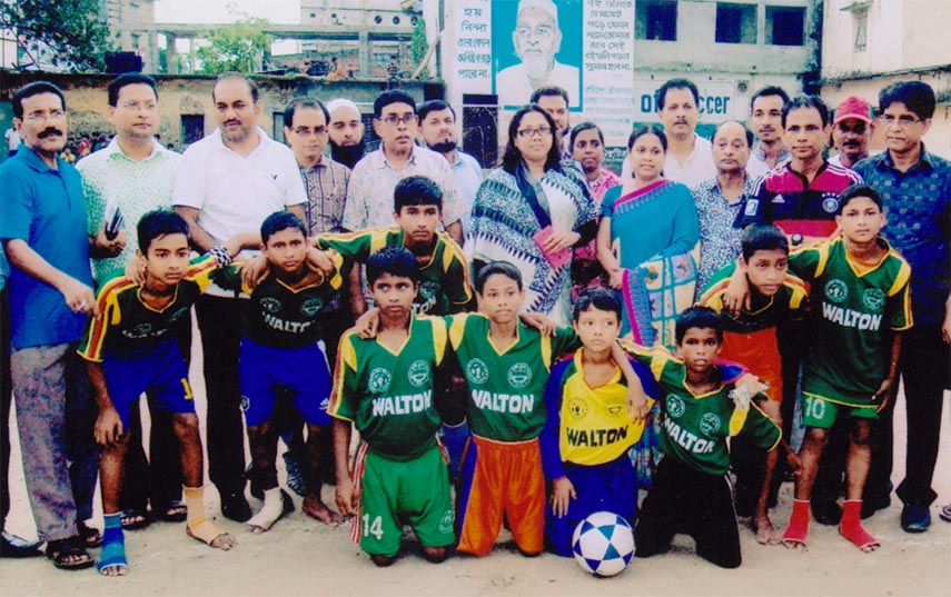 Members of Dholairpar Government Primary School Football team, the champions of the Bangabandhu and Bangamata Primary School Gold Cup Football Tournament pose for a photo session at the Dholairpar High School Ground recently. Dholairpar Government Primary
