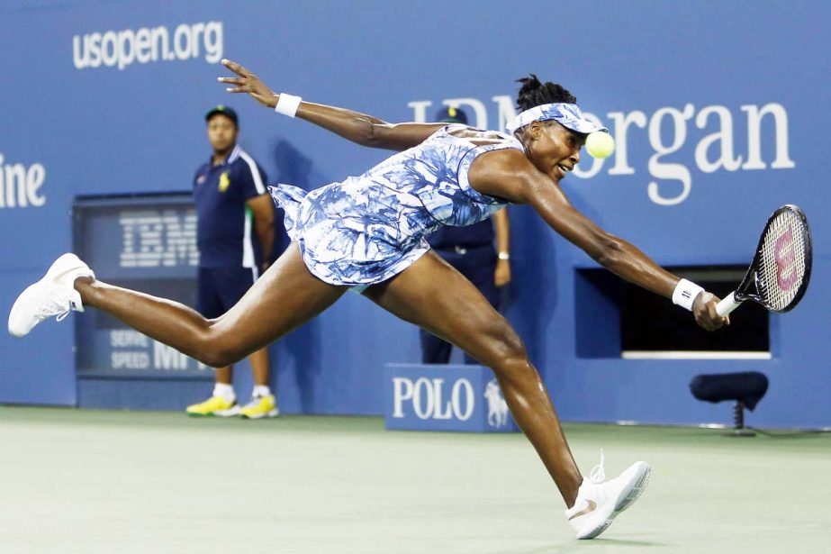 Venus Williams of the United States stretches to return a shot to Timea Bacsinszky of Switzerland during the second round of the US Open tennis tournament in New York on Wednesday.