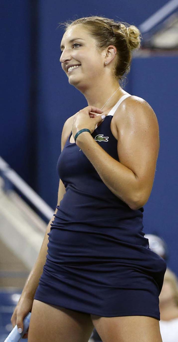 Timea Bacsinszky of Switzerland reacts after losing a point to Venus Williams of the United States during the second round of the US Open tennis tournament in New York on Wednesday.