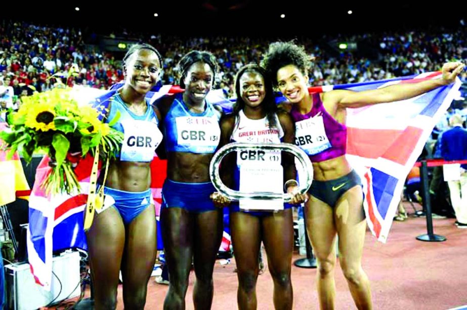 The Great Britain team with Desiree Henry, Anyika Onoura, Asha Philip and Ashleigh Nelson (from left to right) celebrates after the women's 4x100m relay race of the IAAF Diamond League international athletics meeting in the Letzigrund stadium in Zurich,