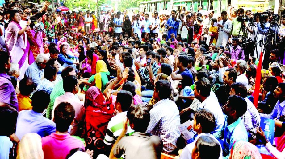 Workers of Tuba Group garment factories organized a rally in front of the Jatiya Press Club on Friday protesting closure of factories and demanding payment of their salaries.