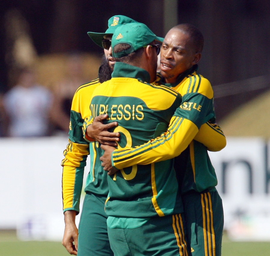 South Africa's bowler Aaron Phangiso celebrates a wicket with teammates during the one-day international triangular series cricket match between South Africa and Zimbabwe at the Harare Sports Club on Friday.