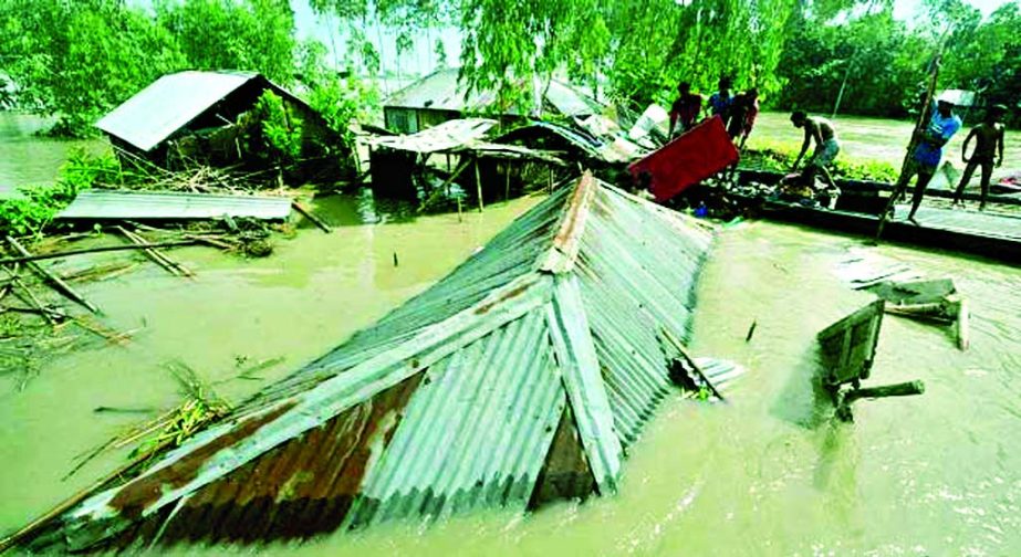 Many inmates on Saturday trying hard to save their household goods and other essentials as their houses got inundated totally in the devastated hilly waters in Sirajganj and Kazipur of Bogra.