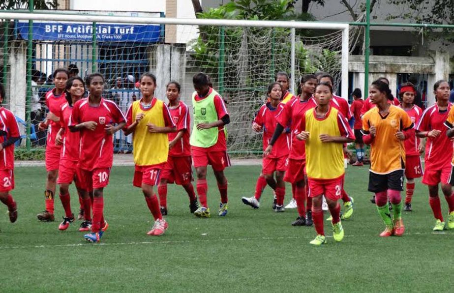 Members of Bangladesh Under-16 National Women's Football team during their practice session at the BFF Artificial Turf on Sunday.