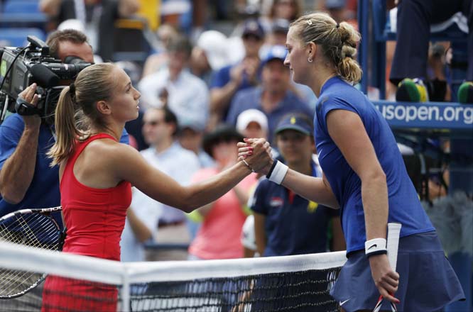 Aleksandra Krunic of Serbia (left) greets Petra Kvitova of the Czech Republic after winning their third round match of the 2014 US Open tennis tournament on Saturday.