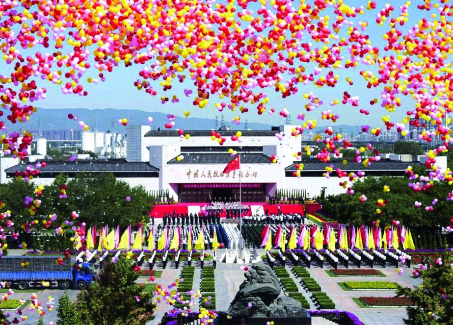 Balloons are released into the air during a ceremony to mark the 69th anniversary of China's victory over Japan at the Museum of the War of Chinese People's Resistance Against Japanese Aggression, in Beijing on Wednesday.