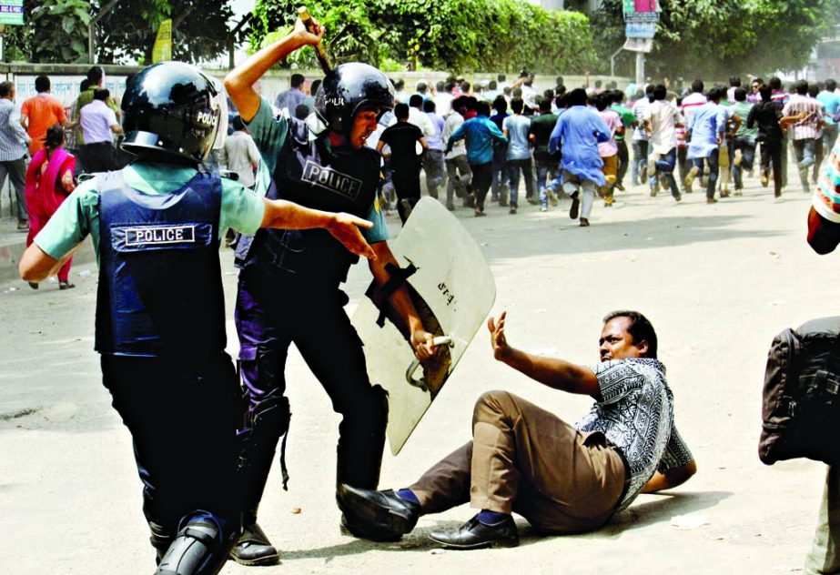 Law enforcers charged batons to disperse the BNP supporters, gathered outside the Dhaka Court soon after party Chief Begum Khaleda Zia reached there to appear in the graft cases on Wednesday.