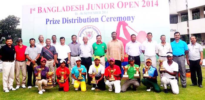 Quarter Master General of Bangladesh Army Lieutenant General Anwar Hossain and the winners of the Bangladesh Junior Open Golf Tournament pose for a photograph at the Kurmitola Golf Club in Dhaka Cantonment on Thursday.