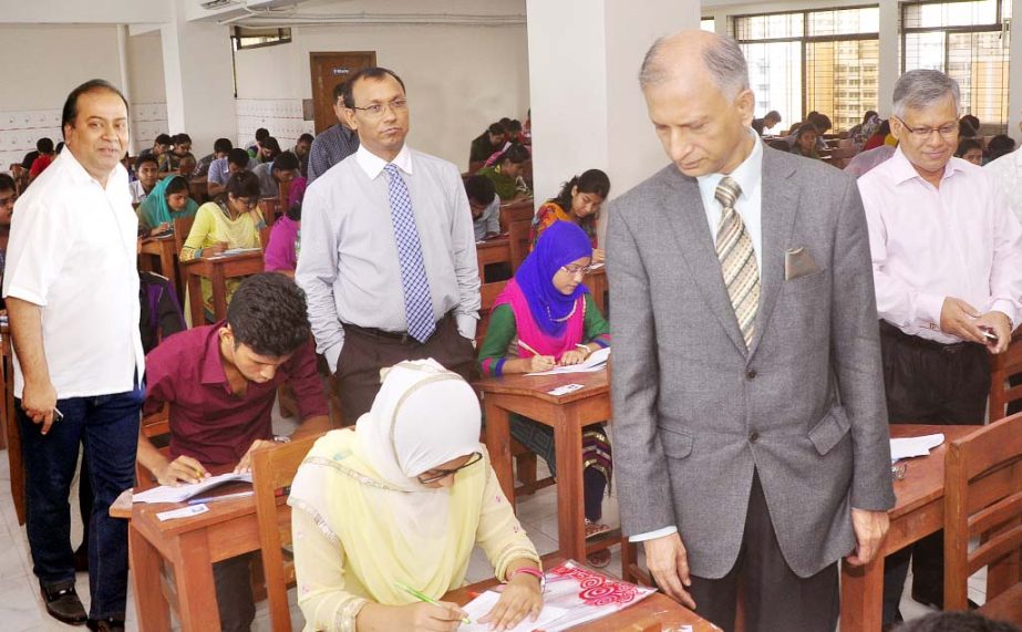 DU VC Prof Dr AAMS Arefin Siddique visiting an examination hall of written test for admission into 1st year BBA classes for the session 2014-2015 under Ga-Unit of the University of Dhaka held on Friday. Pro-Vice Chancellor (Administration) Prof Shahid A