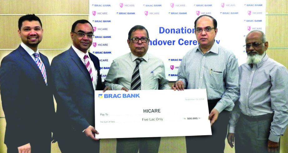Syed Mahbubur Rahman, Managing Director and CEO of BRAC Bank handing over a cheque to Prof Anwar Hossain, Chairman of Hicare Society to purchase a Brain Stem Audiometer for hearing impaired children of Bangladesh at the bank's head office recently.