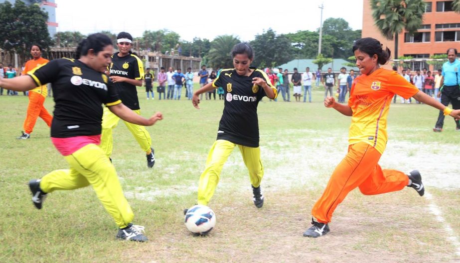 A moment of the football (female) match of the Annual Inter-Department Football Tournament of Gono Bishwabidyalay between Politics & Government Department and Pharmacy Department at the Gono Bishwabidyalay Ground in Savar on Saturday.