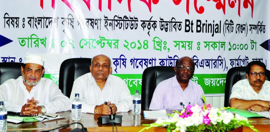 Director General of Bangladesh Agriculture Research Institute Dr Rafiqul Islam Mondol, among others, at a press conference on 'Bt Brinjal' at its seminar room in the city's Farmgate on Sunday.