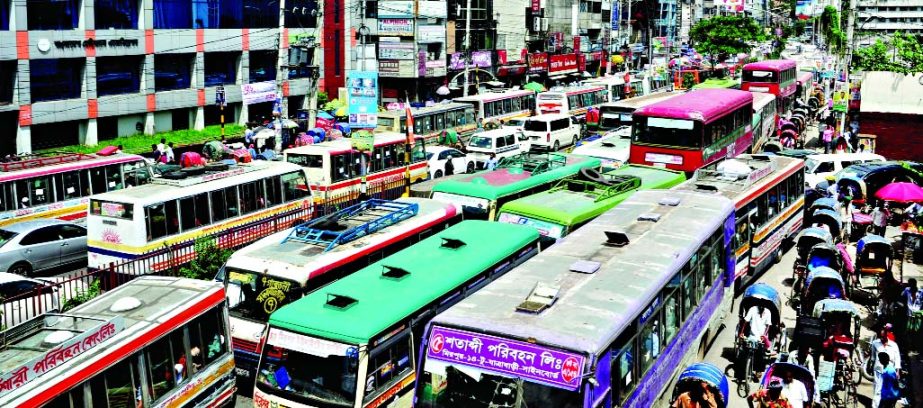 City witnessed massive traffic jam and most of the heavy buses remained stranded causing immense sufferings to passengers. This photo was taken from Topkhana Road on Monday.