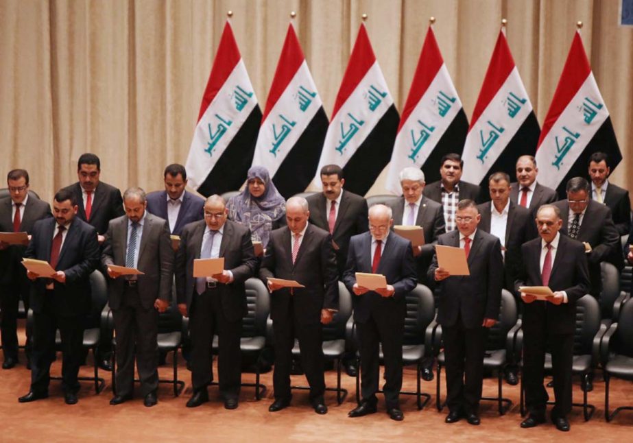 The new Iraqi government participates during a swearing in ceremony in Baghdad