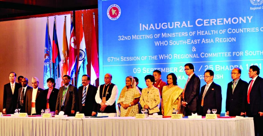 Prime Minister Sheikh Hasina poses for a photo session with the World Health Organisation (WHO) leaders after the inaugural ceremony of 32nd meeting of Ministers of Health of South Asia Region held at a local hotel on Tuesday.