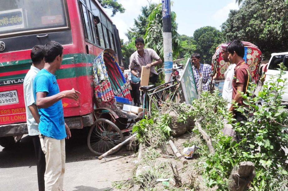 A rickshaw was damaged when a speedy bus rammed it in the city's Topkhana road on Thursday. This situation happens almost every day but the authority concerned seemed to be blind to check it due to unknown reason.