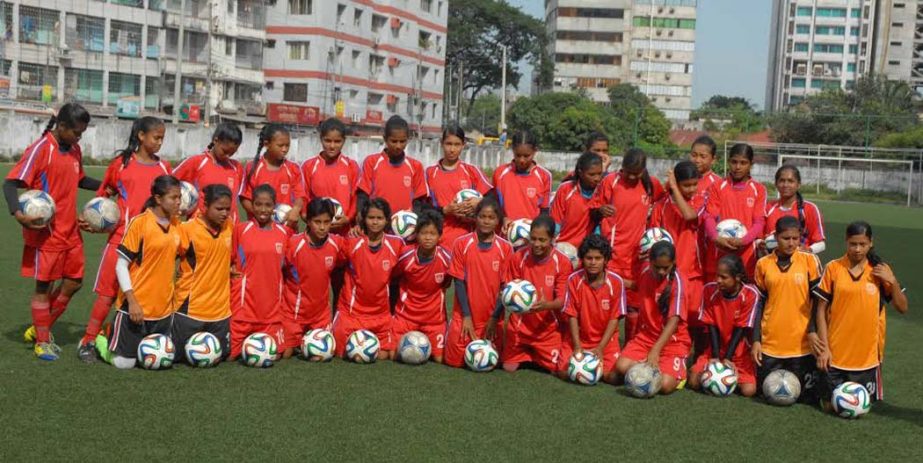 Members of Bangladesh Under-16 National Women's team pose for camera at the BFF Artificial Turf on Thursday.