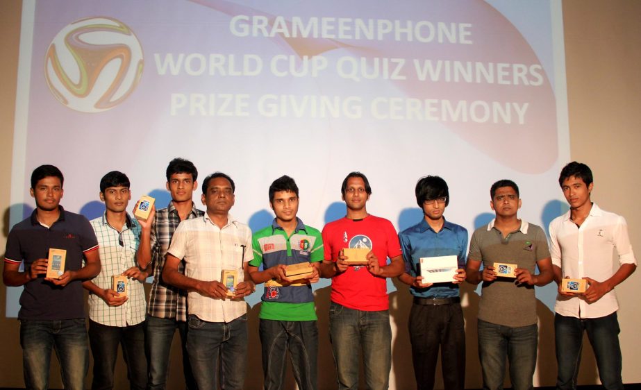 The winners of Grameenphone World Cup Quiz Competition pose with their prizes at the GP Head Office in the city recently.