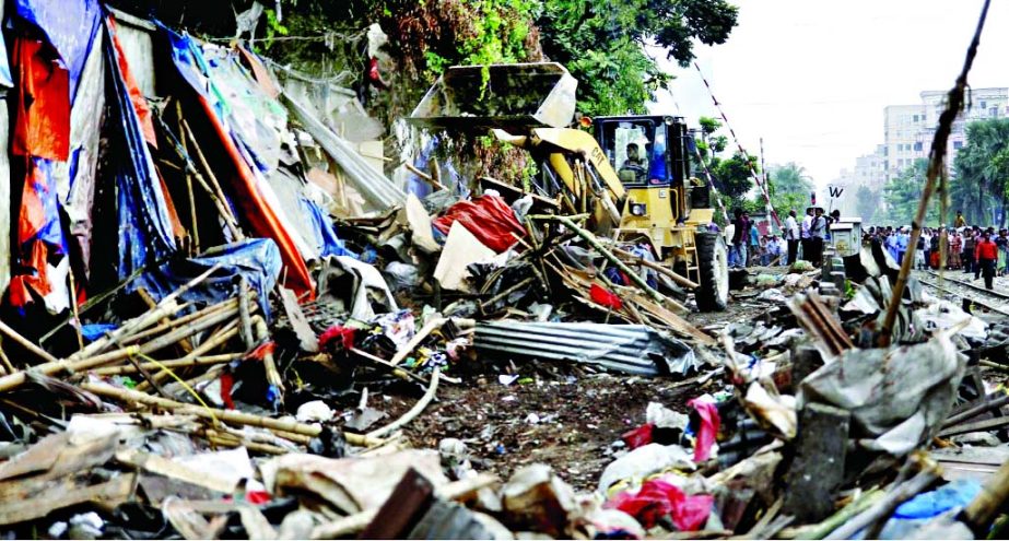 BETTER LATE THAN NEVER: After Thursday's deadly mishap, Railway authority started demolishing illegal establishments set up on both sides of tracks in city's Karwanbazar area on Friday.