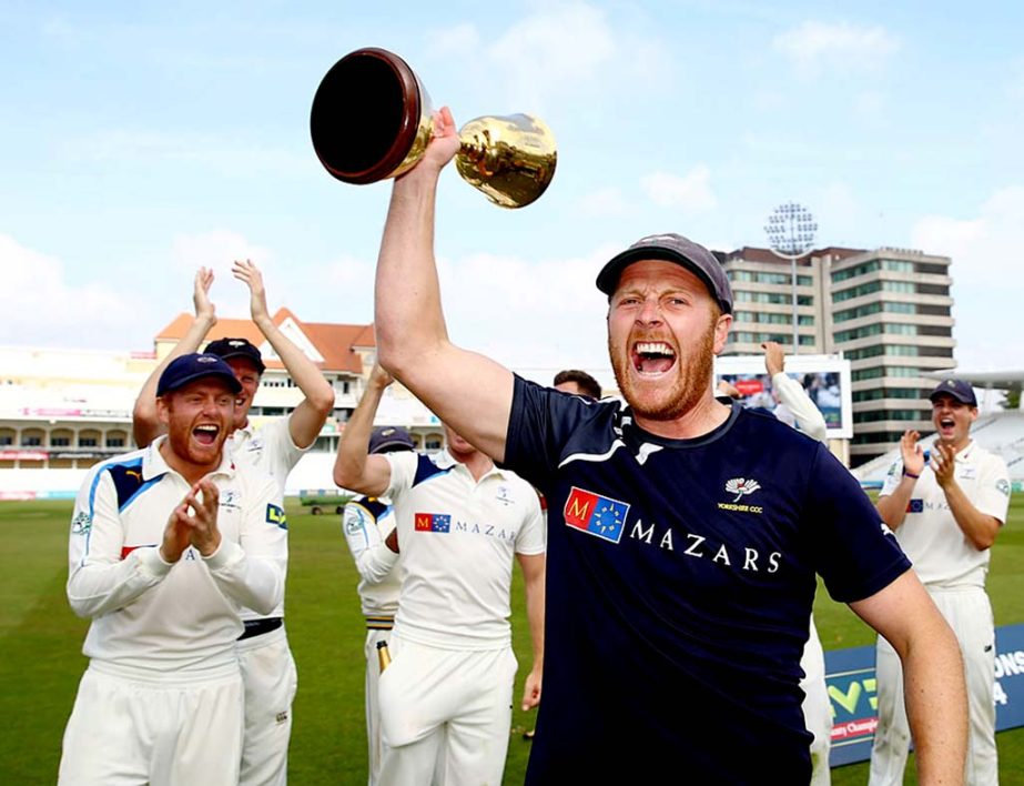 Andrew Gale, Yorkshireâ€™s suspended captain gets his hands on the trophy after the final match of County Championship, Division One between Yorkshire and Nottinghamshire at Trent Bridge on Friday.