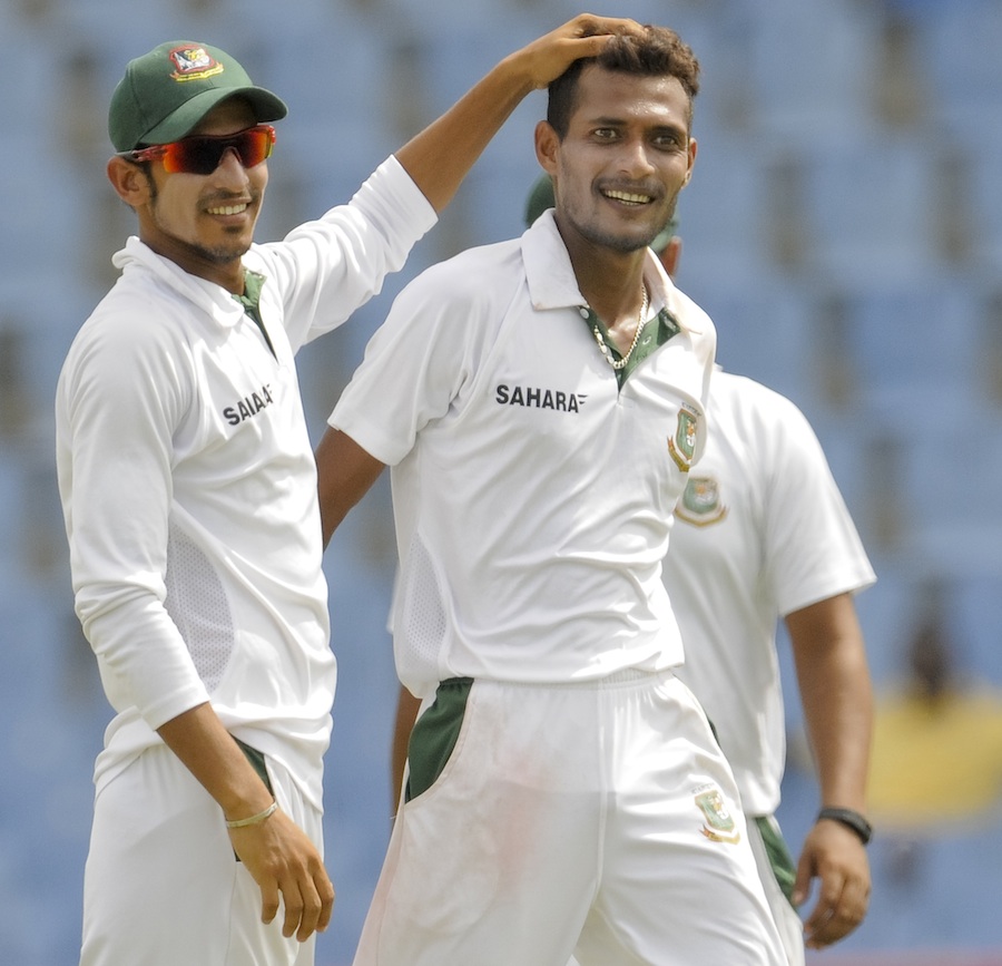 Nasir Hossain congratulates Shafiul Islam on a wicket on the 1st day of the 2nd Test between Bangladesh and West Indies at St Lucia on Saturday.