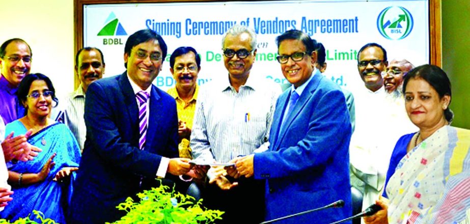 Dr Md Zillur Rahman, Managing Director of Bangladesh Development Bank Limited, handing over DSE membership to Kazi Morshed Hossain Kamal, Chairman of BDBL Investment Services Limited after signing of a vendors agreement recently. BDBL Board Chairman Prof