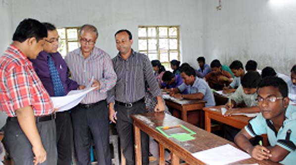 Pro-Vice-Chancellor of Bangladesh Open University (BOU) Prof Dr Khondoker Mokaddem Hossain visiting the SSC Examination at Dhanmondy Govt Boys High School in the capital on Friday. Abul kasem Shikder Joint Director, Information and public Relations Divisi