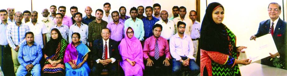 Dr M Mosharraf Hossain, Chairman and Managing Director of Rapport Bangladesh Limited posing with the trainees of a training course on "Management and Manager" for energy sector companies organised by Bangladesh Petroleum Institute in the city recently.