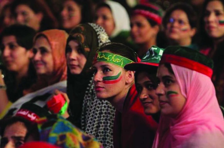 Supporters of the chairman of the Pakistan Tehreek-e-Insaf (PTI) political party Imran Khan, listen to his speech during what has been dubbed a "freedom march" in Islamabad.