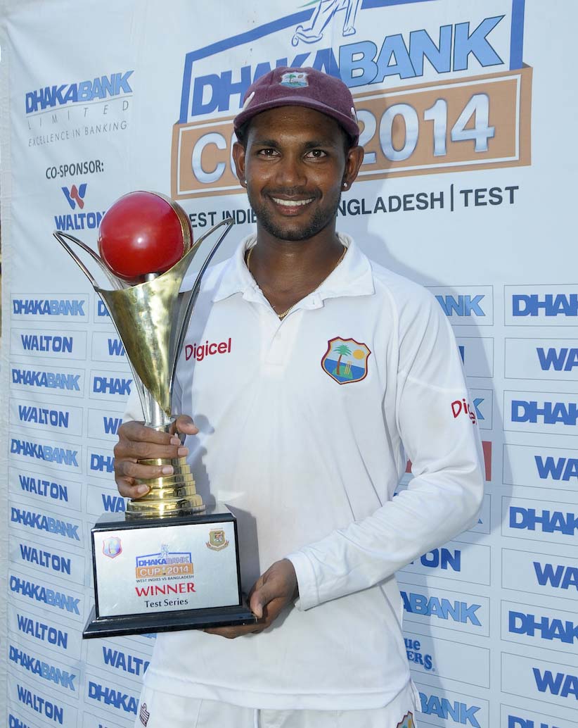 Denesh Ramdin poses with the trophy after his first series win as captain on the 4th day of the 2nd Test between West Indies and Bangladesh at St Lucia on Tuesday.