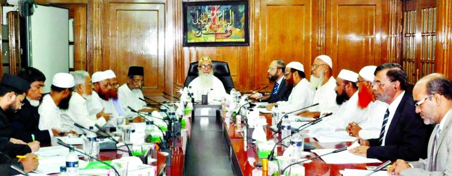 Sheikh Moulana Mohammad Qutubuddin, Chairman of the Shari'ah Supervisory Committee of Islami Bank Bangladesh Limited, presiding over the Shari'ah Council meeting at its head office on Monday.