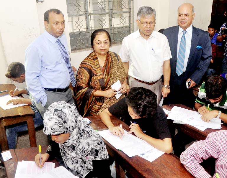 Dhaka University acting VC Prof Dr Nasreen Ahmad visiting an examination hall of written test for admission into 1st year Honors' classes for the session 2014-2015 under Kha-Unit on Friday. Pro-Vice Chancellor (Administration) Prof Shahid Akhtar Hossain,