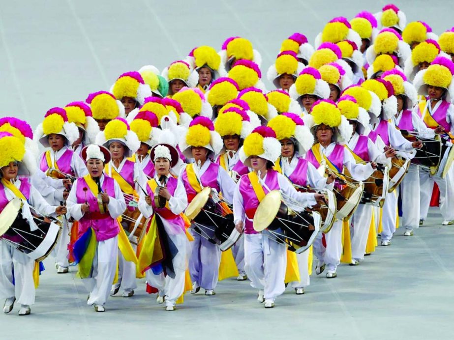 Local drummers perform during the opening ceremony of Asian Games at Incheon on Friday.