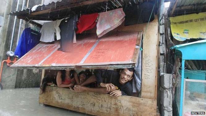 Floodwaters were up to neck height in some areas of Philippines.