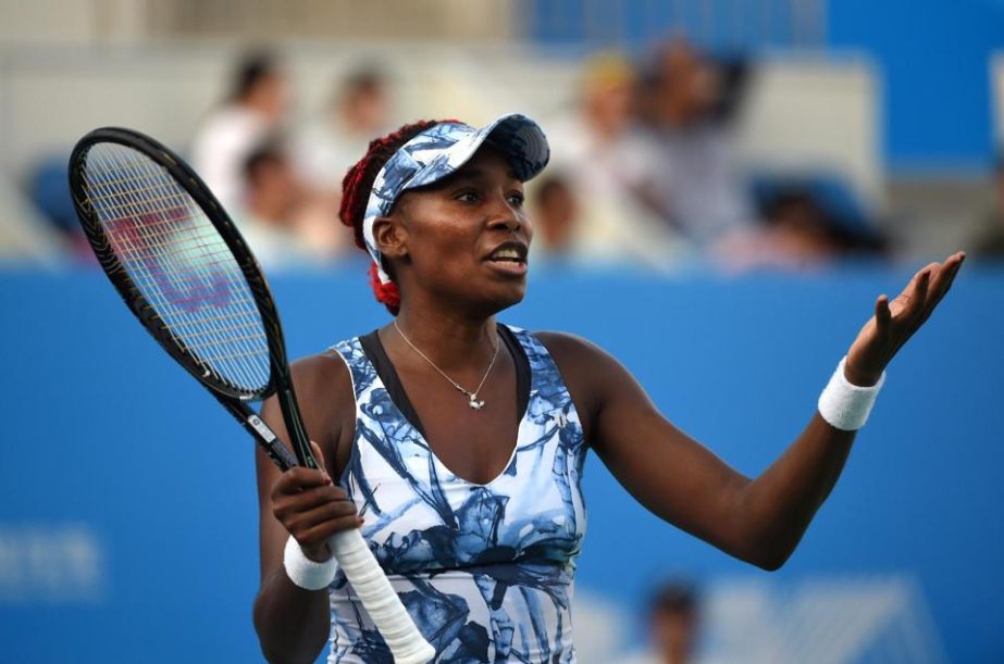 Venus Williams of the United States questions a decision by the umpire during her match against Caroline Garcia of France at the Wuhan Open in China on Sunday.
